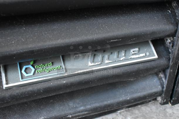 2018 True GDM-41SL-48-HC-LD cooler merchandiser label, showing "natural refrigerant" marking in good condition.