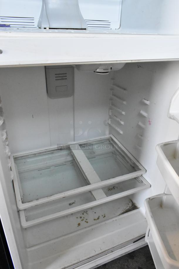 Maytag M1TXEGMYW01 metal cooler with freezer, 115V, 1 phase. Visible interior, shelves, and some wear.