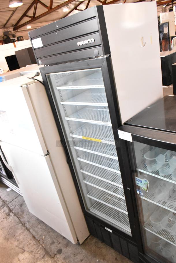2019 Habco SE18 metal commercial reach-in cooler with single glass door and poly-coated racks; 115 volts, 1 phase.