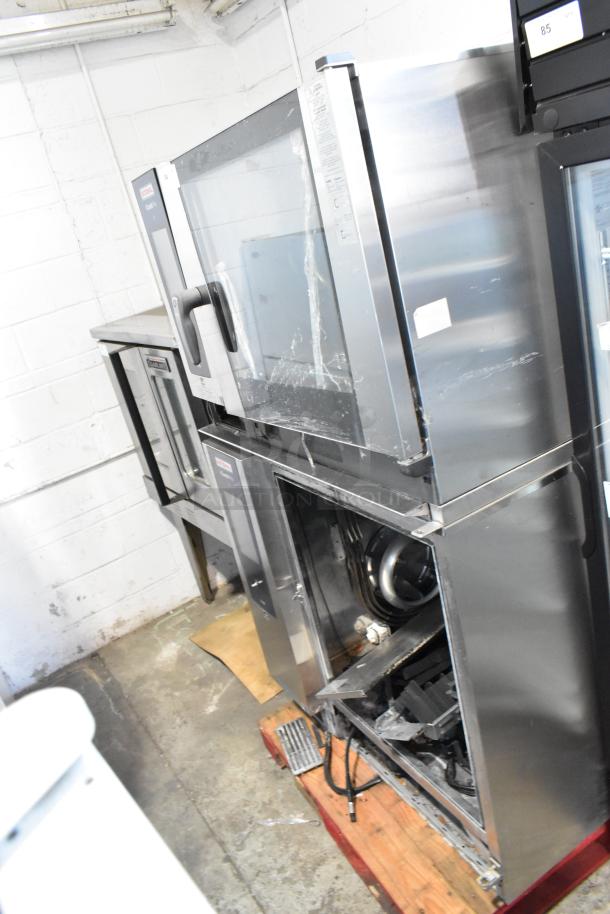 Two Rational iCombiPro convection ovens, stainless steel, electric, 440/480V, 3-phase. Slight wear visible.