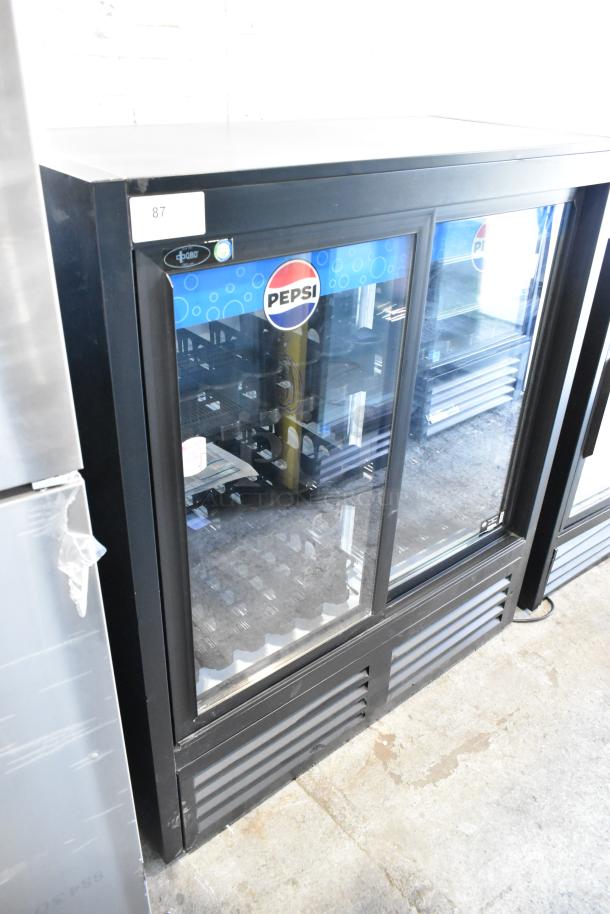 QBD CD4154-HC metal 2-door commercial cooler with poly-coated racks, Pepsi branding, in good condition. 115V, 1 phase.