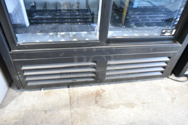 QBD CD4154-HC 2-door reach-in cooler, metal frame, glass doors, poly-coated racks, 115 volts, used condition.