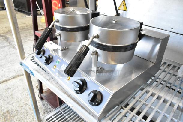 Brand new Carnival King 382WSM double waffle maker, stainless steel, non-stick, with timers. 120 Volts, 1 Phase.