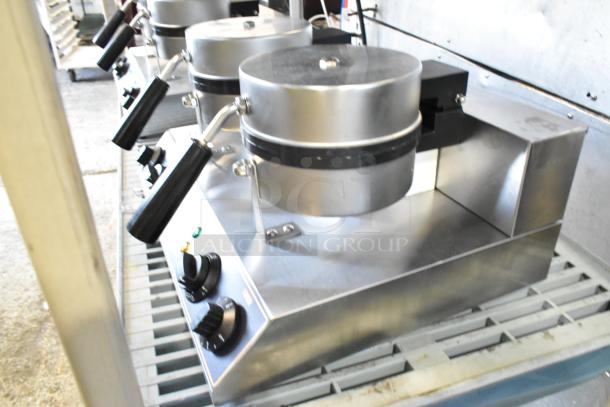 Brand new Carnival King double waffle maker, model 382WSM, stainless steel, non-stick, with timers. Scratch and dent condition.