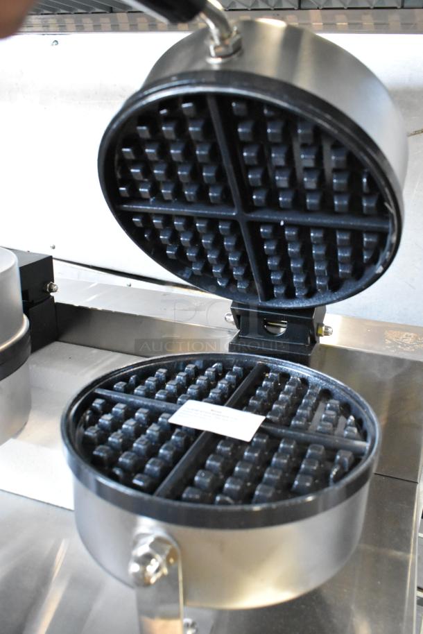 Brand new Carnival King 382WSM stainless steel double waffle maker, non-stick, with timers. 120V, 1-phase, minor scratches.