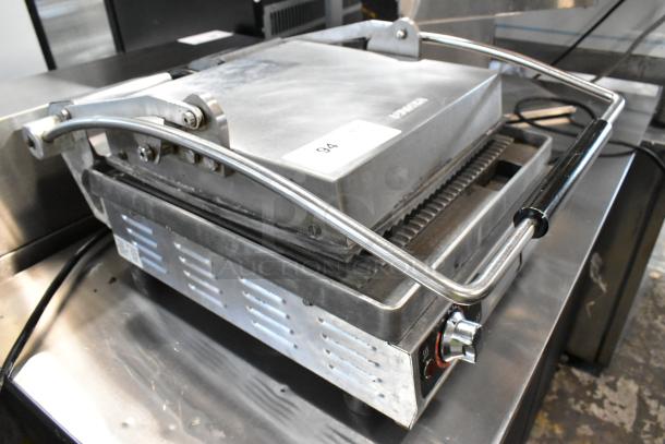 Star Pro Max 2.0 PGT14 stainless steel commercial panini press, 120V, features adjustable handle, durable housing in good condition.