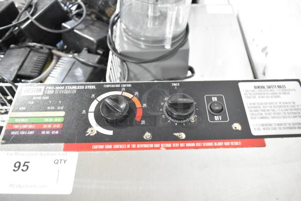 Weston 74-1001-W stainless steel food dehydrator, temperature and timer controls visible, 120 volts, 1 phase.