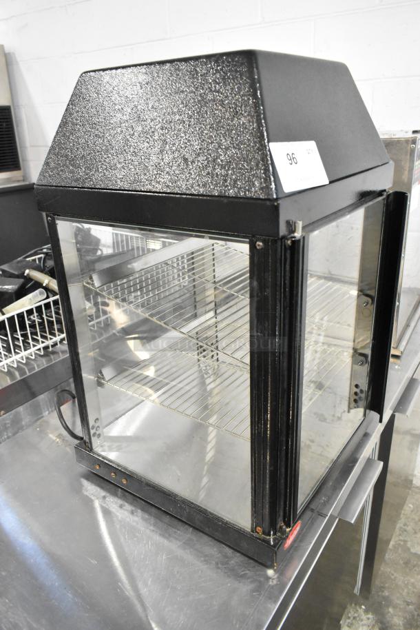 Hatco MDW-1X countertop heated holding case, metal frame, glass sides, two shelves, 120 volts, used condition.