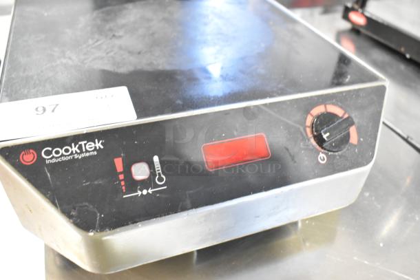 CookTek MC3000 induction range, stainless steel, single burner, digital controls, used condition, model details visible.