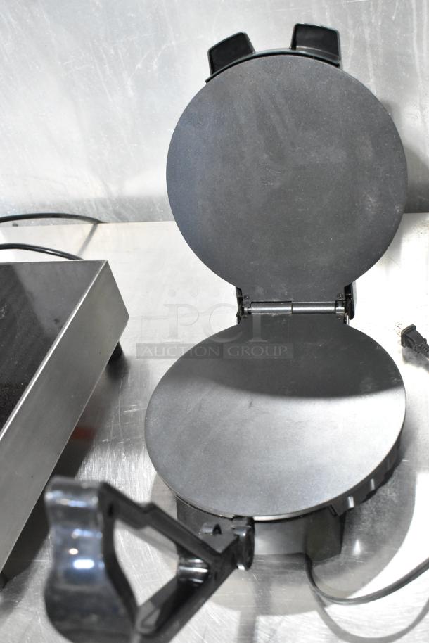Star Blue SB-SW2093 metal waffle maker, 120V, 1 phase, open position on stainless countertop, like-new condition.