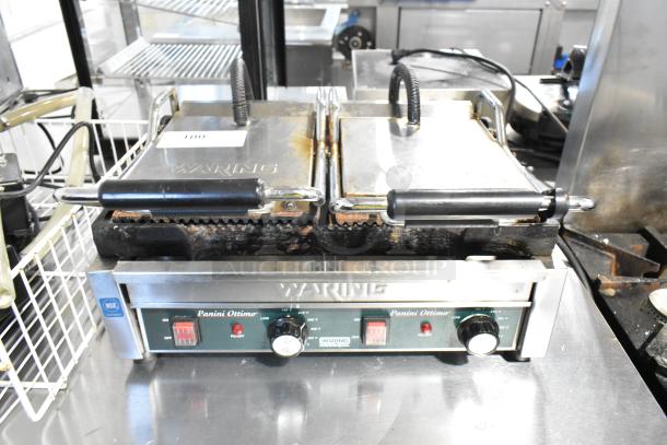 Waring WPG300 Stainless Steel Commercial Double Panini Press, 240V, worn condition, with control knobs and visible branding.