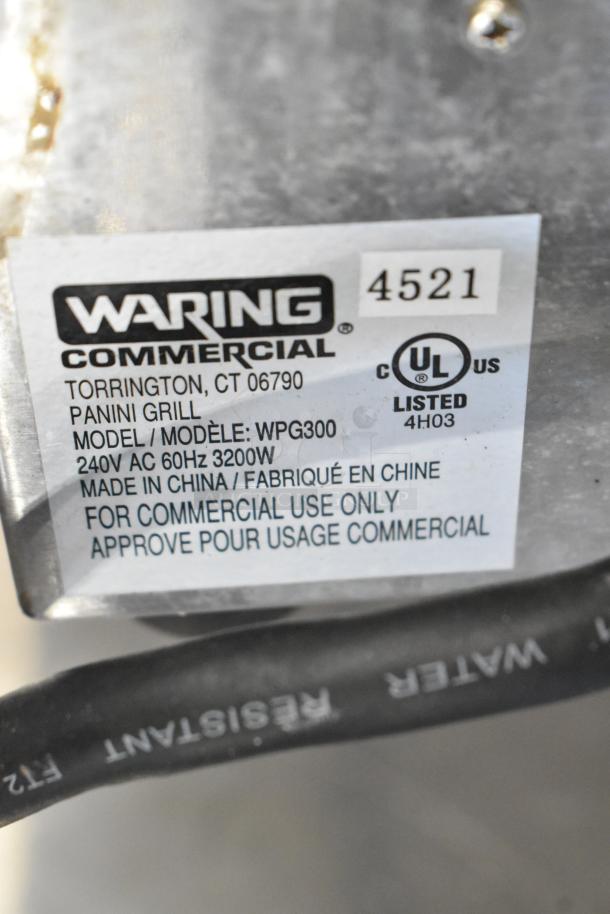 Waring WPG300 Panini Press label showing model, voltage, and commercial use information. UL listed.