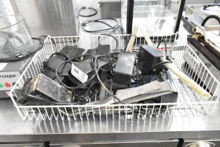 Basket containing eight Beckett CB121LSUK pumps, 120V, 1 phase, used condition. Visible auction tag indicates lot number 102.
