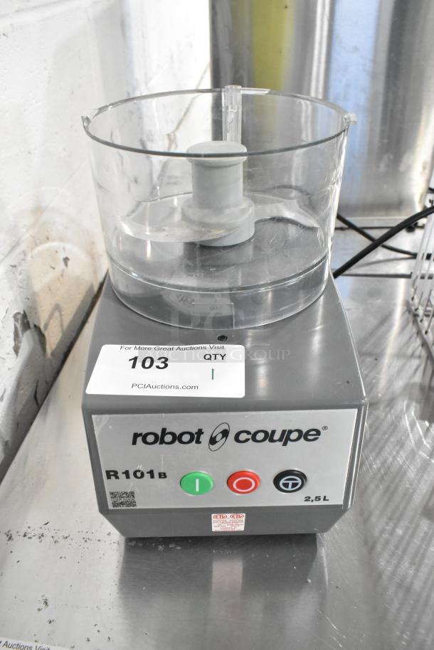 Robot Coupe R 101 B metal countertop food processor, S blade, missing lid. 120V, 1 phase. Auction tag "103".
