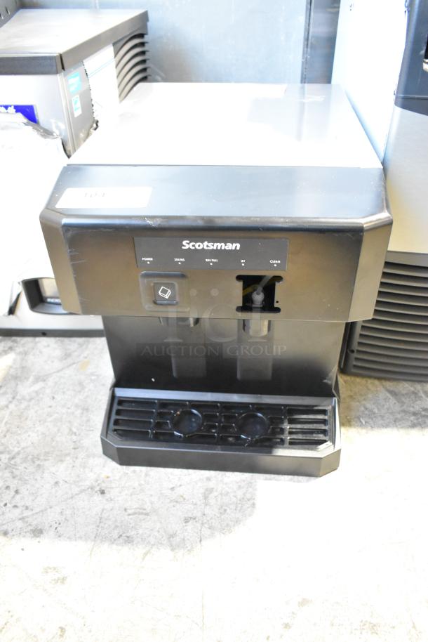 Brand new Scotsman HID207ABX-1A compact nugget ice machine, 196 lb capacity, with 7 lb bin, push button dispenser.