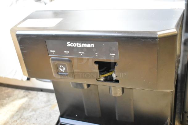 Brand new Scotsman HID207ABX-1A Nugget Ice Machine, 196 lb., push button dispensing, minor dents visible, 7 lb. bin.