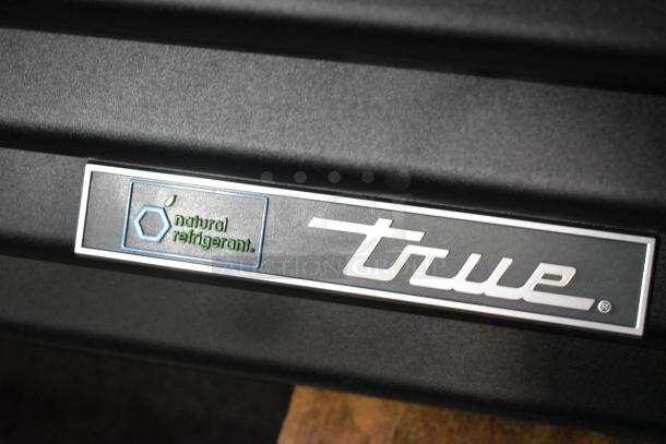 True Metal Commercial 2 Door Cooler, new with minor scratches, natural refrigerant label, 115V, 1 Phase.