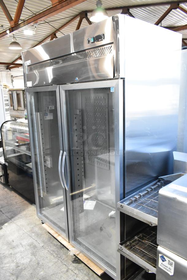 Brand new Avantco 178Z2RGHC stainless steel commercial 2-door reach-in cooler with glass doors and poly-coated racks. 115V, 1 phase.