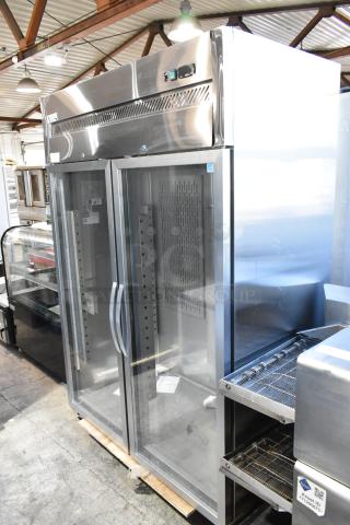 Brand new Avantco 178Z2RGHC stainless steel commercial 2-door reach-in cooler with glass doors and poly-coated racks. 115V, 1 phase.