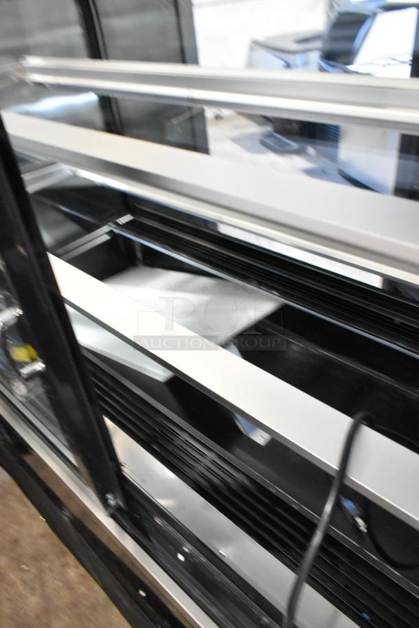 Brand new Avantco 193BCD48B 48" curved glass bakery display case, black, scratch and dent, 115V, 1 phase.