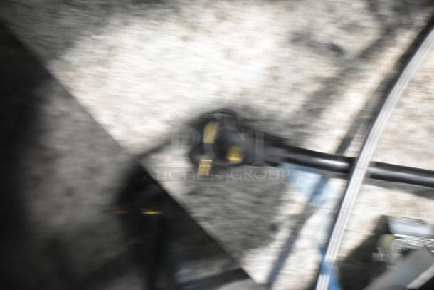 Blurry image of a plug and cable, possibly associated with the XpressChef JET19 oven. Details unclear.