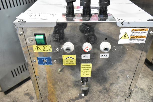 Brand new Narvon 23BUWD20 stainless steel undercounter water dispenser with chilled, ambient, and sparkling options; minor dents visible.