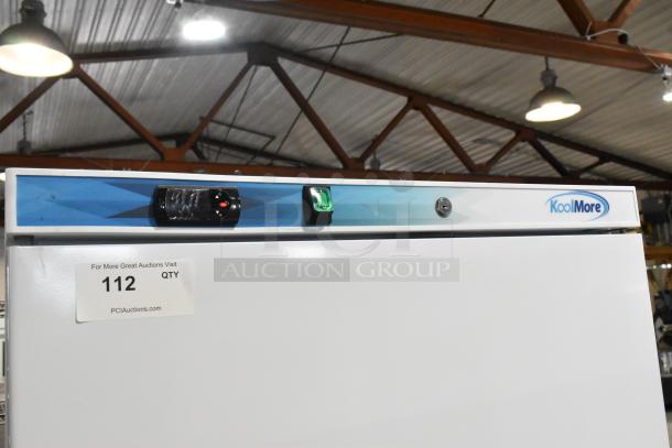 Brand new KoolMore KM-FMD20WH commercial single door freezer with poly-coated racks, 115V, 1 phase, minor scratches.