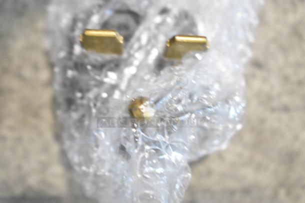 Wrapped components of the Avantco 177SAL23M Salamander in bubble wrap, highlighting packaging details.