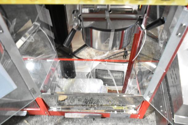 Brand new Carnival King 382PMW17R popcorn machine, 2024 model, 8 oz, with warming/holding merchandiser. Scratch and dent condition.
