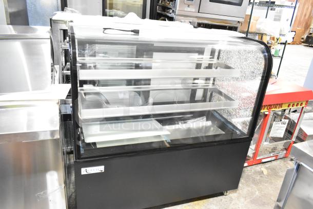 Brand new Avantco 193BC48HCB 48" curved glass refrigerated bakery display case. Note visible glass damage. 115V, 1-phase.