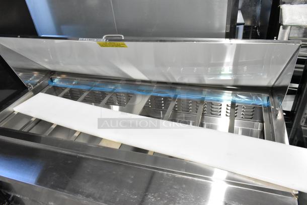 Brand new Avantco 178APT60MHC stainless steel sandwich prep table with mega top, featuring two doors and commercial casters.