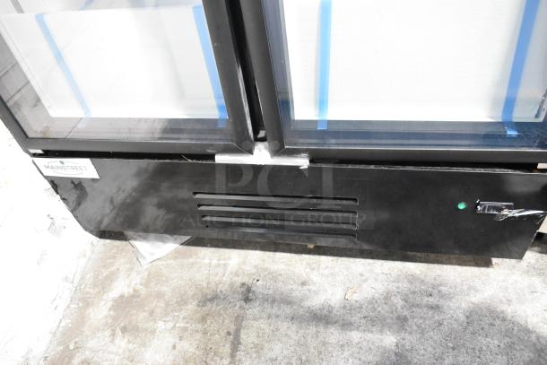Mainstreet 829GMC49B metal commercial swing glass door refrigerator. Black finish, needs door reattachment. 115 volts, 1 phase.