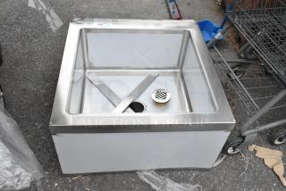 Brand new Regency 600SM242412 mop sink, 16-gauge stainless steel, notched front, 24"x24"x12" bowl, scratch and dent.
