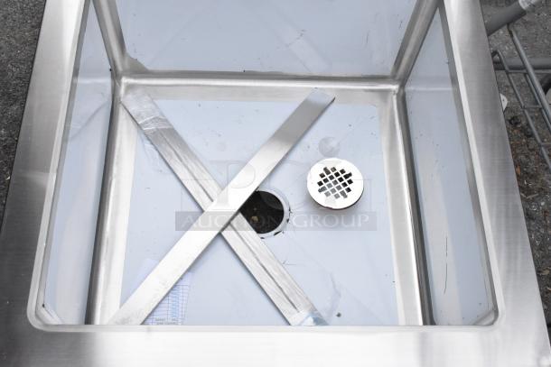 Brand new Regency 600SM242412 stainless steel mop sink, 16-gauge, notched front, 24" x 24" x 12" bowl, minor scratches.