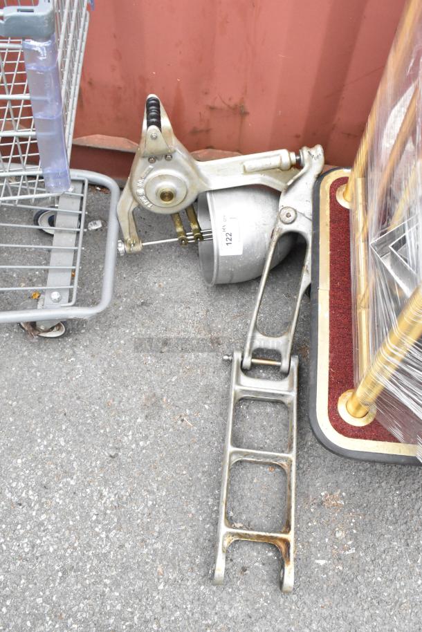 Belshaw Metal Commercial Dough Dropper with hopper and arm, showing signs of use, metal surface visible; labeled "122."