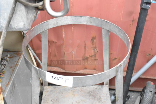 Metal mixing bowl stand with under shelf, visible wear and rust, tag reads "125 QTY 1".