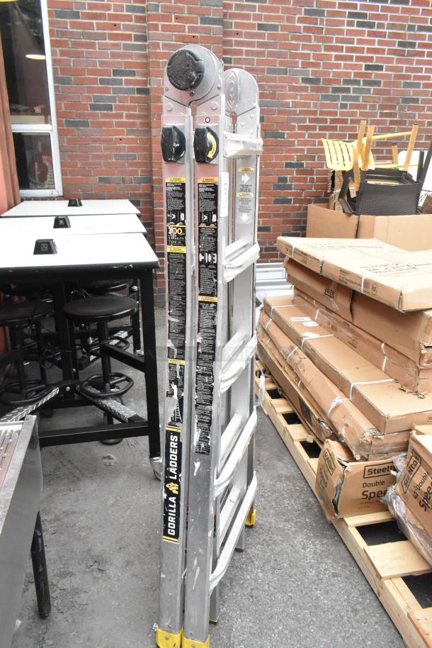 Gorilla Ladders convertible A-frame and flat ladder, metal, 300 lb capacity, visible labels, good condition.
