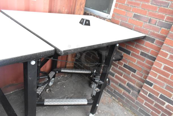 Three tables with attached stools, sizes 30x36x46 and 51x36x46. Features black metal frames and white tops. Industrial style.