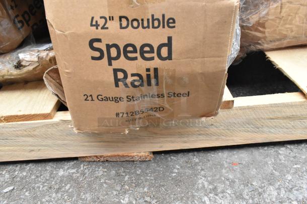 Brown box labeled "42\" Double Speed Rail, 21 Gauge Stainless Steel, #712B5542D, Made in China" on wooden pallet.