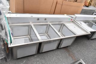 Regency 600S3182418R stainless steel 3 bay sink with right side drain board, brand new, scratch and dent, no legs.