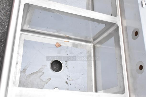 Regency 600S3182418R 3-bay stainless steel sink, scratch and dent, no legs, right side drain board, commercial use.
