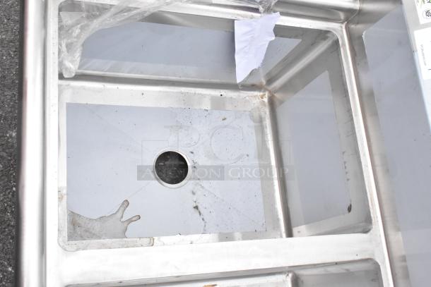 Stainless steel Regency 3-bay sink with right side drain board, scratch and dent, no legs, commercial use.