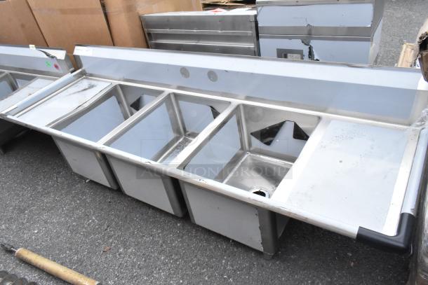 BRAND NEW SCRATCH AND DENT! Regency 600S31824218 stainless steel 3-bay sink with dual drain boards, visible minor marks.