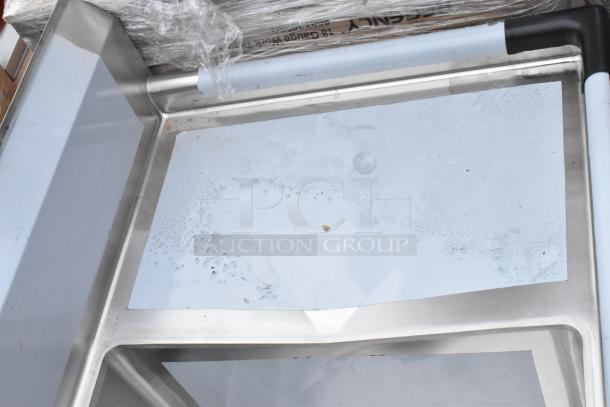 Regency 600S31824218 stainless steel 3 bay sink with dual drain boards, brand new with minor scratches.