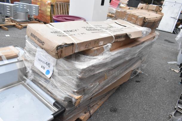 13 scratch and dent stainless steel tables. Items are new, boxed, with minor exterior damage. Boxes labeled "Regency" and "600WS1860HD."
