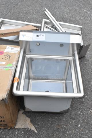 Brand new Steelton 522CS11515 stainless steel single bay sink, scratch and dent, without legs, shown with visible tags.