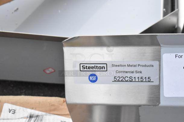Steelton 522CS11515 Stainless Steel Single Bay Sink, brand new, scratch and dent condition, no legs, visible label.