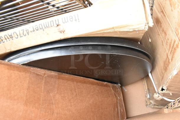 10 brand new scratch and dent items including wire shelves and chairs in original packaging, minor box damage visible.