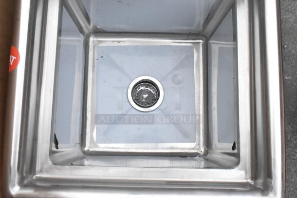Brand new Steelton 522CS11515 stainless steel single bay sink, no legs, scratch and dent condition, visible drain.