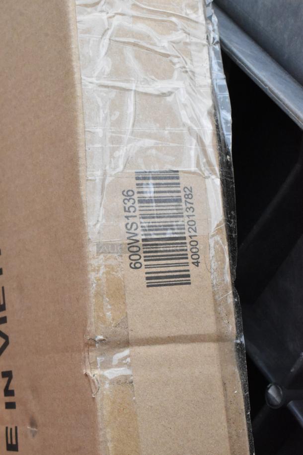 Box with barcode label showing item number 600WS1536 and code 400012013782. Packaging shows tape and minor wear.
